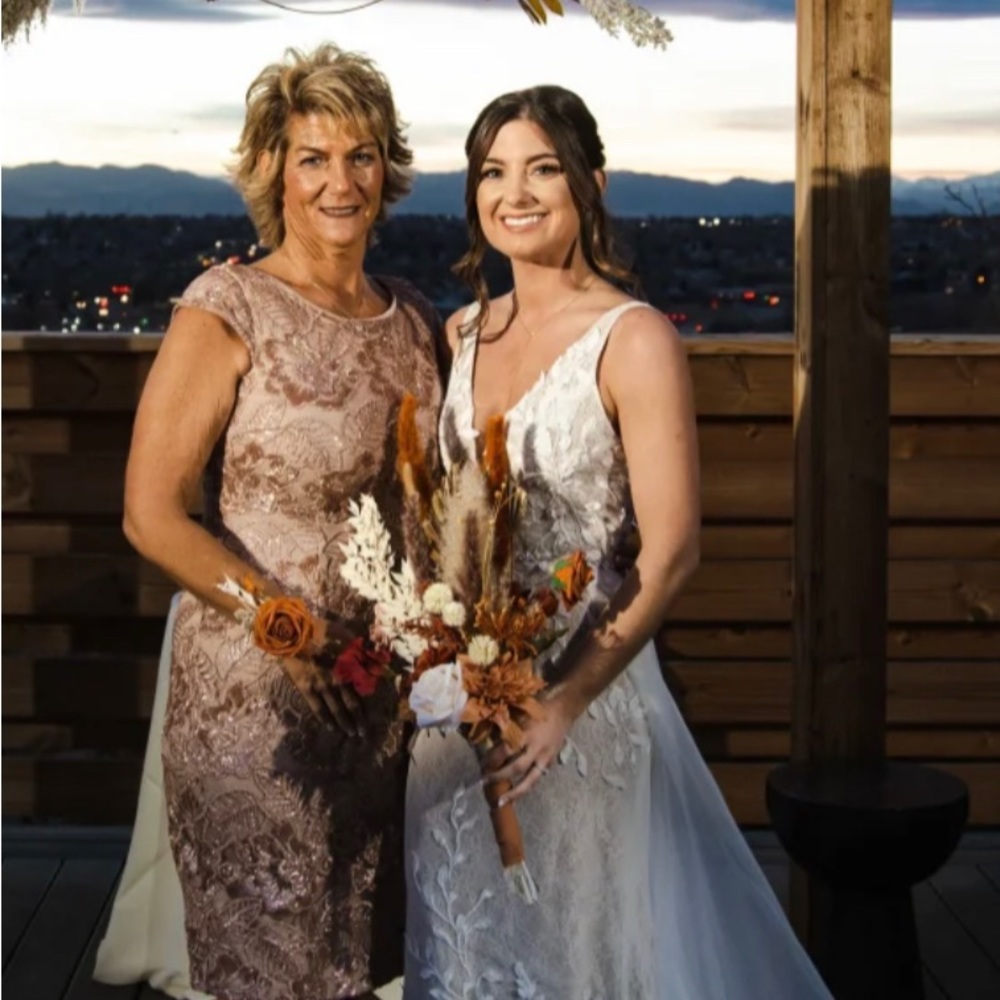 Elegant, yet not over the top fancy, Mother’s Dress. Worn once. Very well kept.